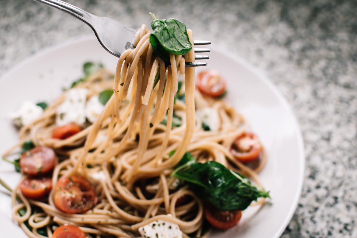 Realistic spaghetti dining scene — the kind of shot Gemini Omni now generates convincingly